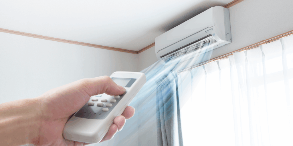 Ductless mini split heat pump system head with a remote